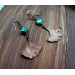 Copper ginkgo earrings with malachiter