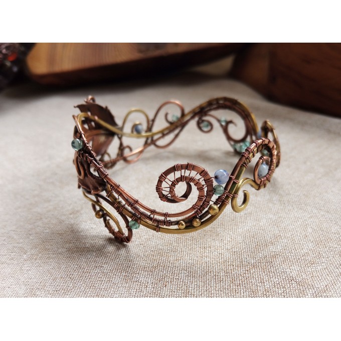 Wire wrap bracelet with copper feather and gemstone beads