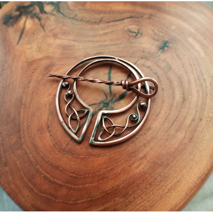 Copper celtic brooch