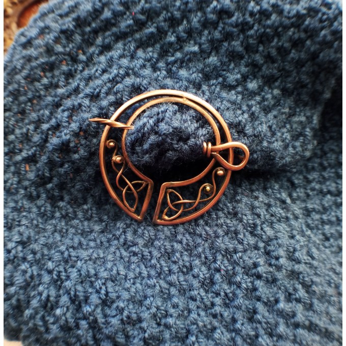 Copper celtic brooch