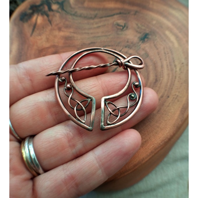 Copper celtic brooch