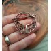 Copper celtic brooch