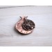 Copper filigree pomegranate brooch with garnet
