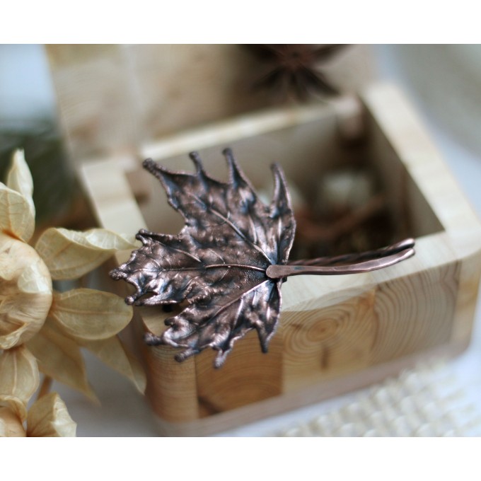 Copper maple leaf brooch