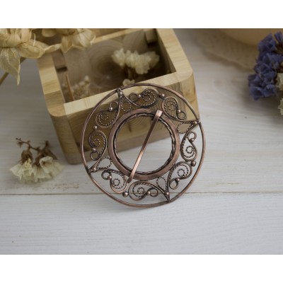 Copper filigree brooch