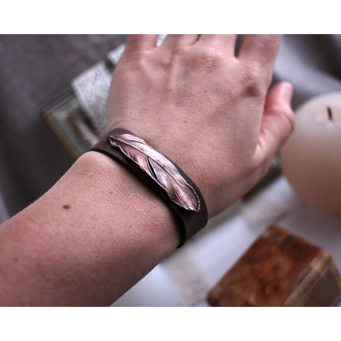 Leather bracelet with copper feather