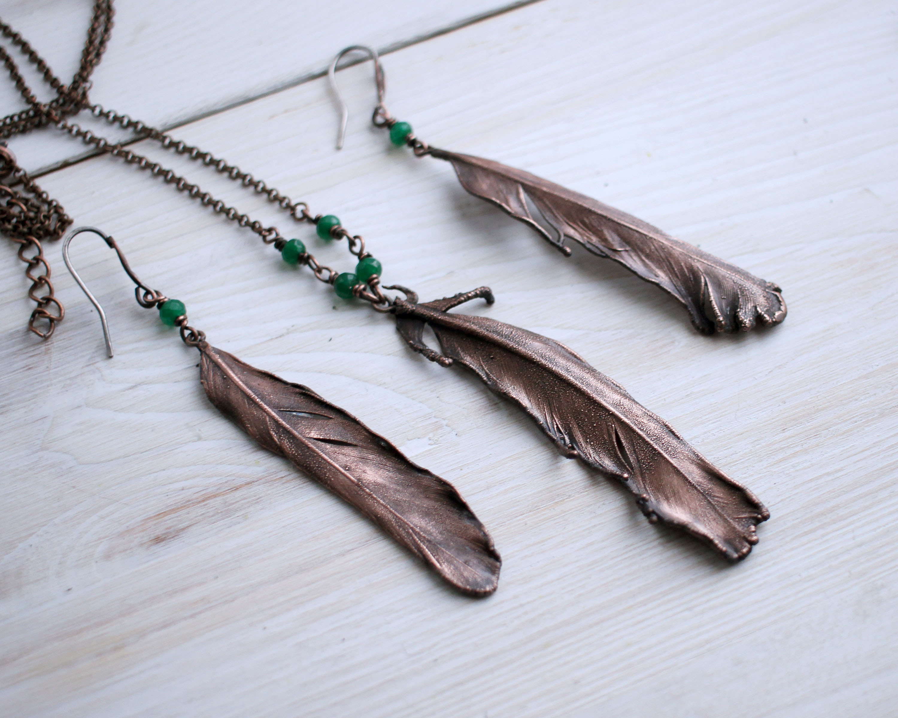 copper feather earrings with onyx